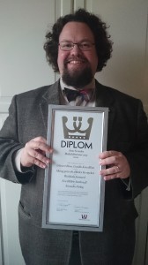 Edward Blom och diplom för ”Årets överdådare 2013”